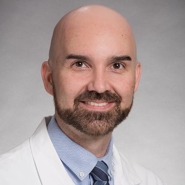 Cory Simpson, MD/PhD/FAAD